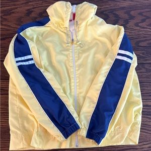 Gloria Vanderbilt XL Sports, Light Yellow Rain Jacket with Blue Stripes.